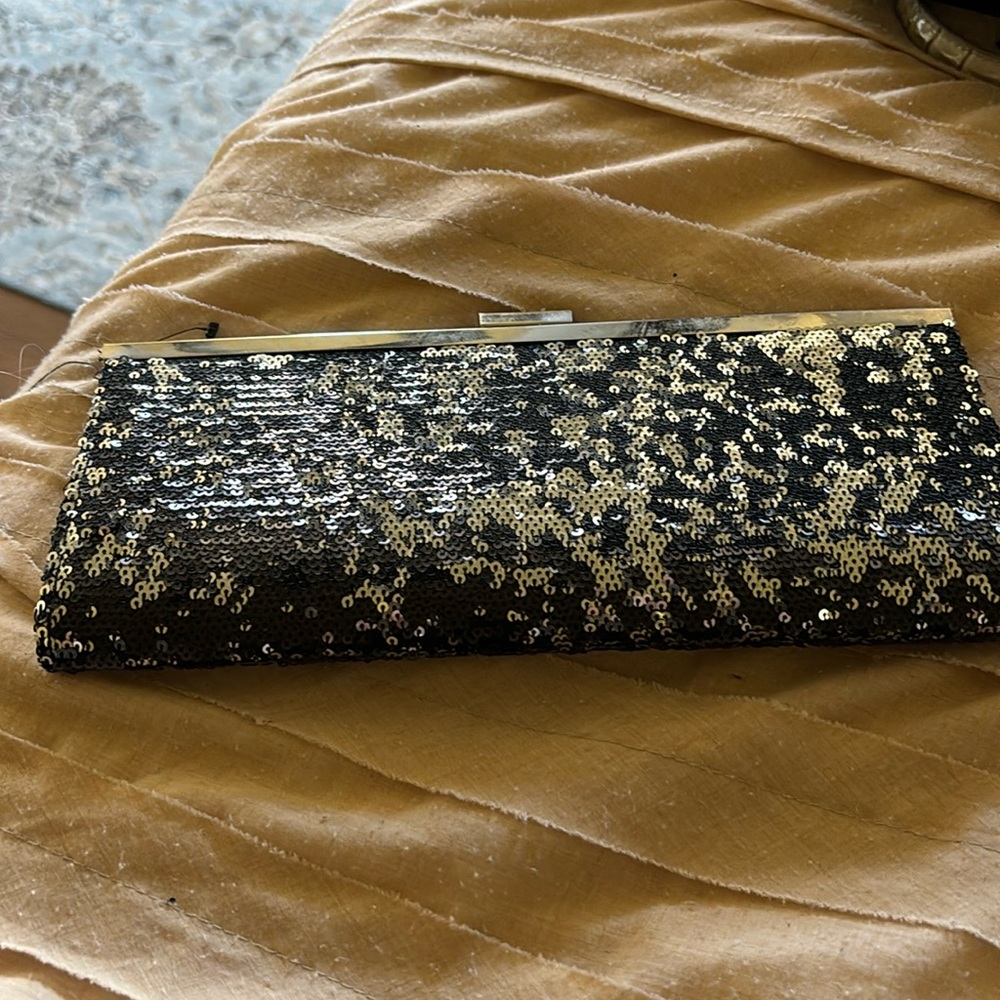 Black and silver sequin clutch